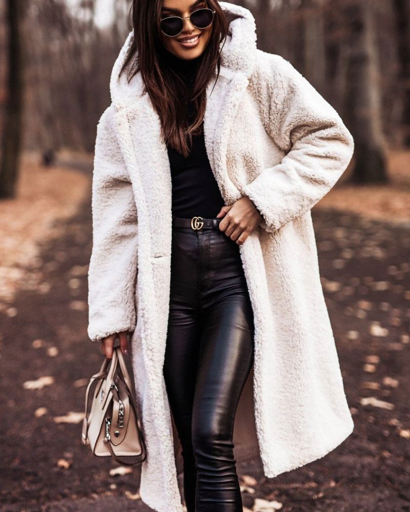 Woman in long hooded teddy coat