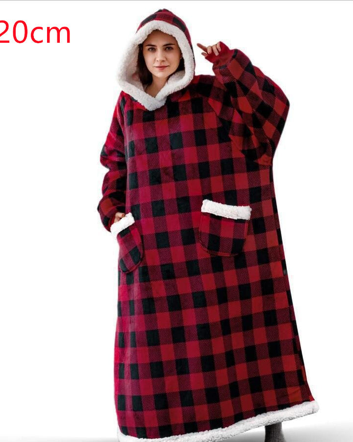 Oversized sherpa hoodie blanket on the couch