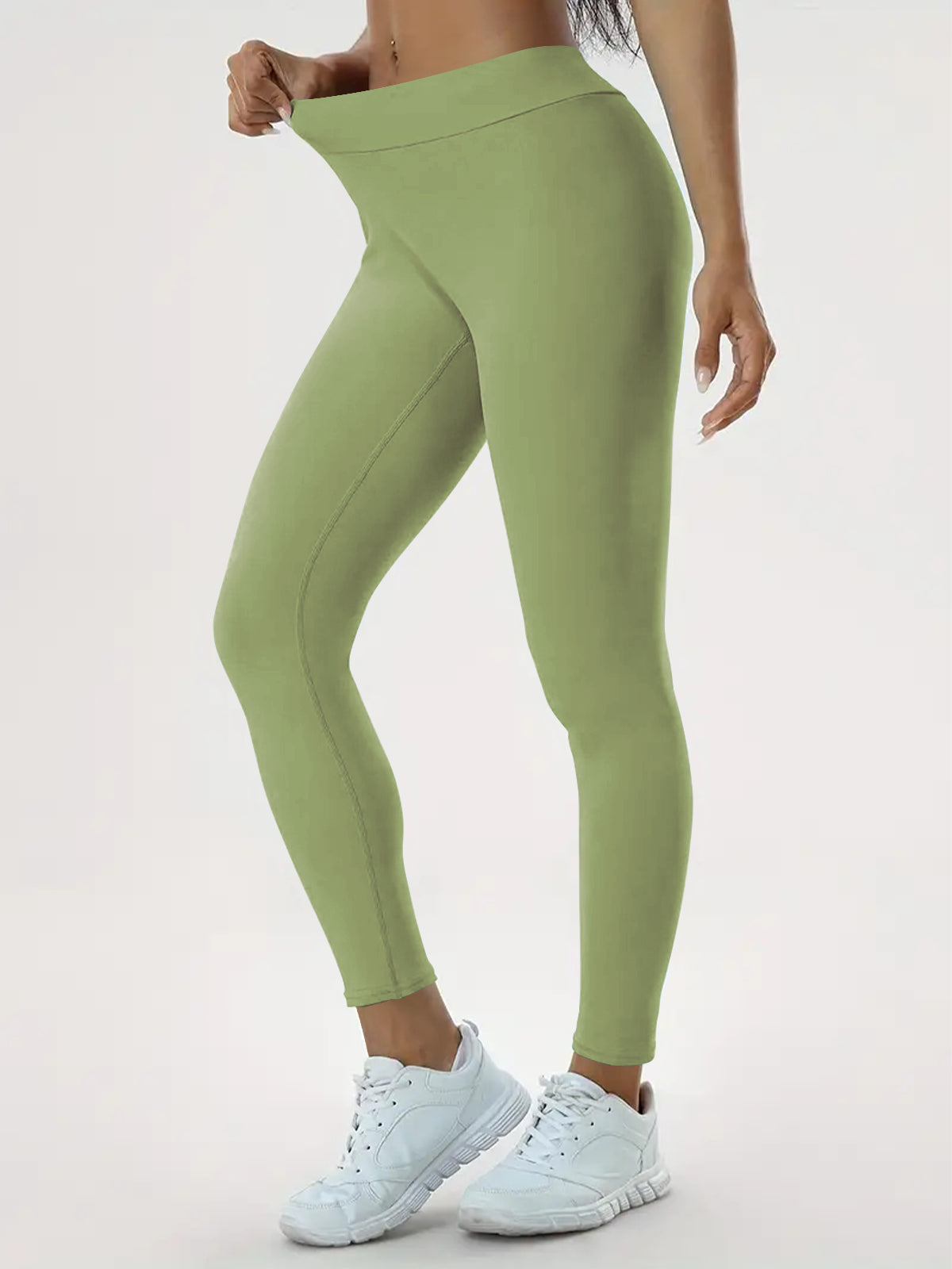 Woman in high-waisted scrunch leggings