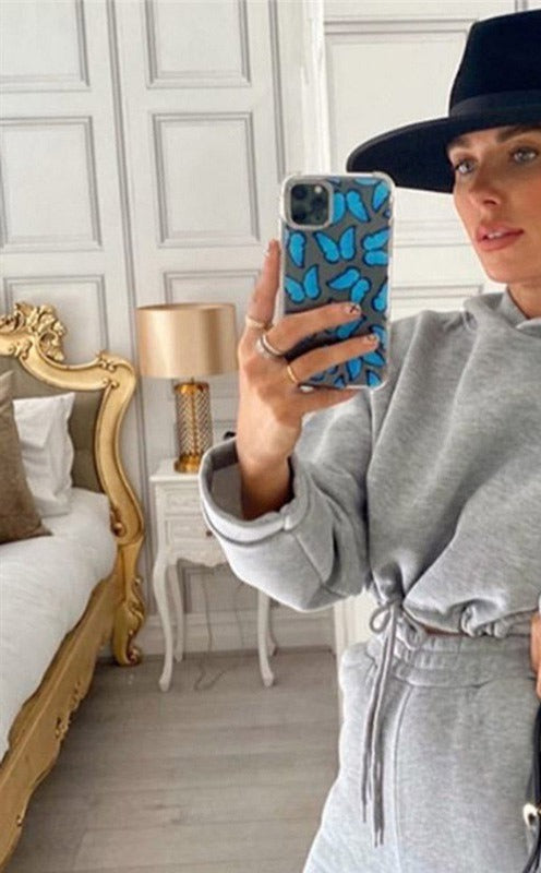 Woman in cropped hoodie and jogger set