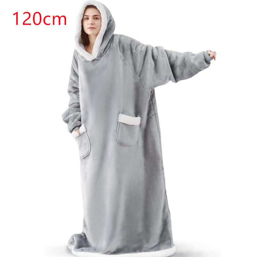 Oversized sherpa hoodie blanket on the couch